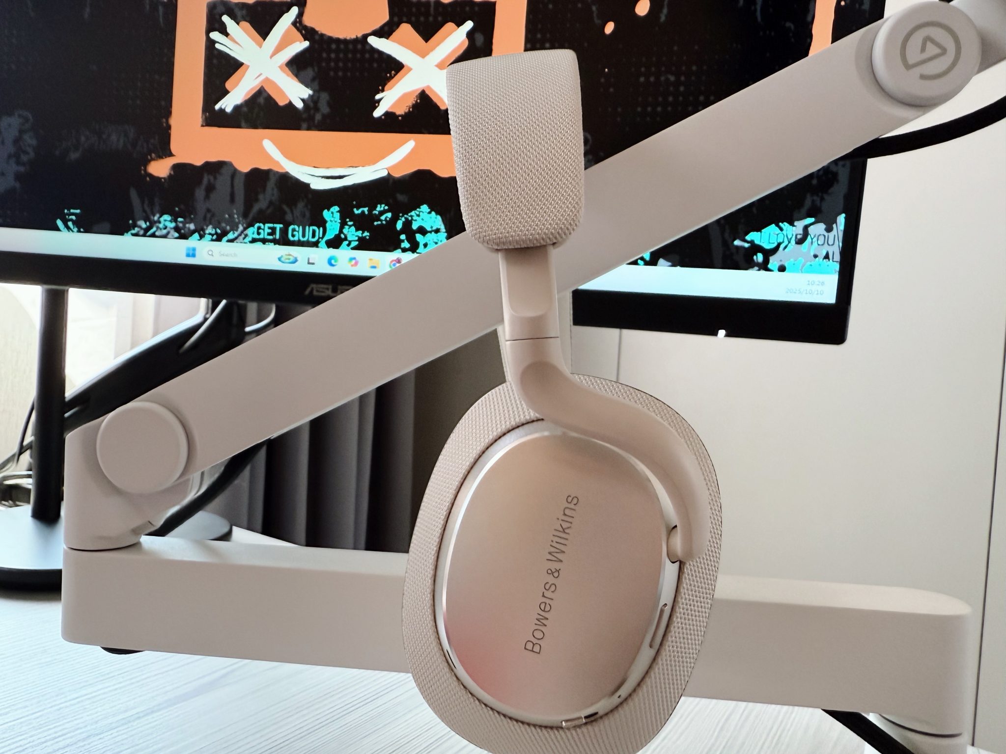 Person wearing Bowers & Wilkins Px7 S3 headphones, enjoying music with closed eyes, highlighting immersive experience.