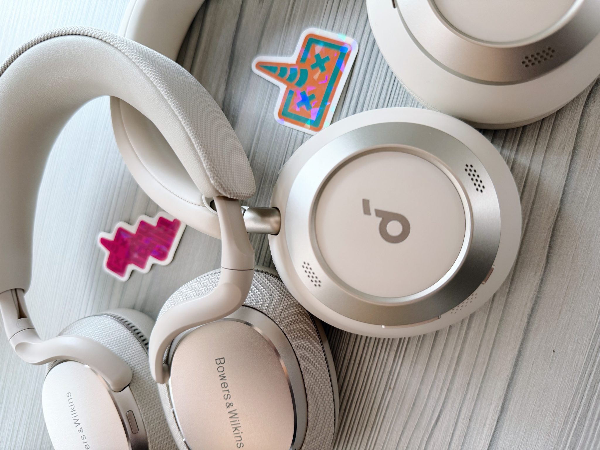Soundcore Space One Pro and Bowers & Wilkins Px7 S3 headphones side by side on a table, showing comparison for South African buyers.