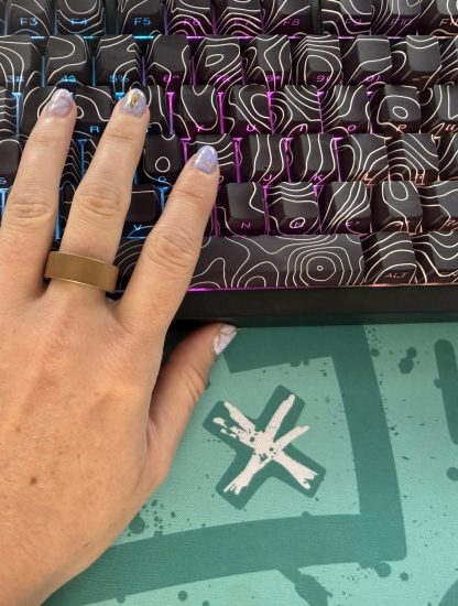 Woman wearing the Ultrahuman Ring Air smart tracker during everyday use