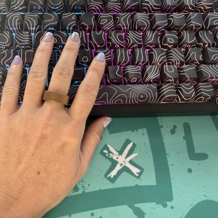 Woman wearing the Ultrahuman Ring Air smart tracker during everyday use