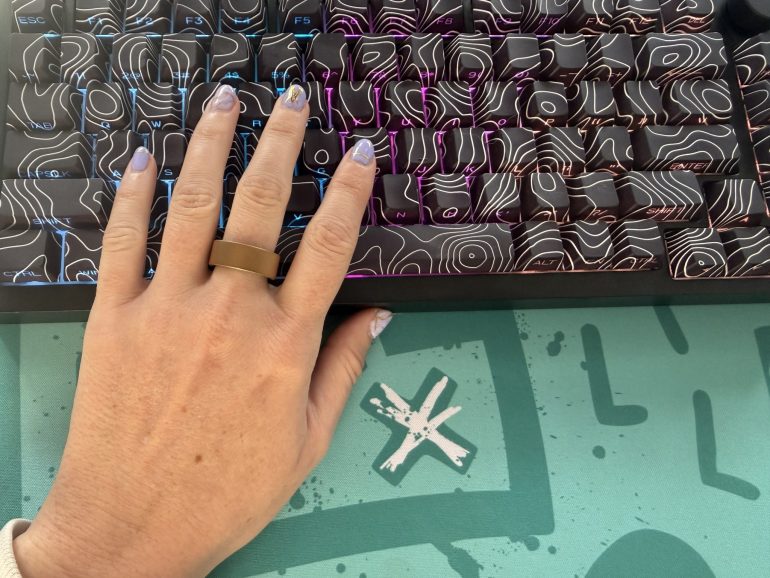 Woman wearing the Ultrahuman Ring Air smart tracker during everyday use